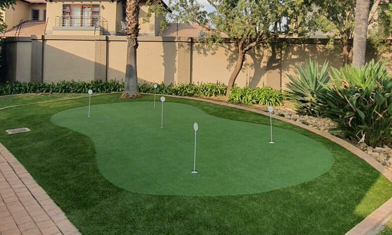 artificial grass putting green in back garden